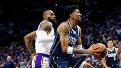 Dallas Mavericks forward Christian Wood (35) drives to the basket past Los Angeles Lakers forward LeBron James (6) during the second quarter at American Airlines Center.