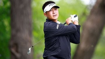 Carl Yuan of China hits his first shot on the 18th hole during the second round of the RBC Canadian Open