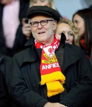 The American actor has been spotted donning a red and white scarf at the Anfield Road ground.