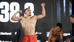 LAS VEGAS, NEVADA - AUGUST 12: Junior welterweight boxer Teofimo Lopez Jr. poses during an official weigh-in at Resorts World Las Vegas on August 12, 2022 in Las Vegas, Nevada. His opponent Pedro Campa gets dressed at right.   Steve Marcus/Getty Images/AFP
== FOR NEWSPAPERS, INTERNET, TELCOS & TELEVISION USE ONLY ==