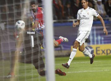 Diego Costa scoring his side's first goal past Real Madrid goalkeeper Keylor Navas