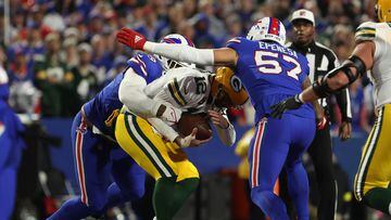 ORCHARD PARK, NEW YORK - OCTOBER 30: Tim Settle #99 of the Buffalo Bills sacks Aaron Rodgers #12 of the Green Bay Packers during the first quarter at Highmark Stadium on October 30, 2022 in Orchard Park, New York.   Timothy T Ludwig/Getty Images/AFP