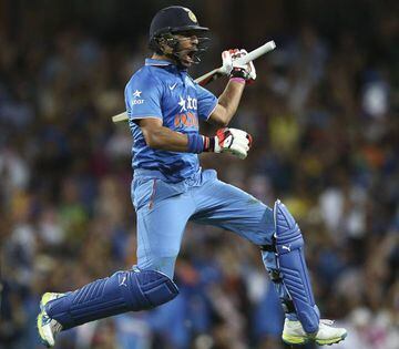 Indian batsman Yuvraj Singh celebrates after they defeated Australia in their T20 International cricket match in Sydney, Australia.