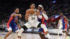 Jan 23, 2023; Detroit, Michigan, USA; Milwaukee Bucks forward Giannis Antetokounmpo's (34) drives to the basket against Detroit Pistons guard Rodney McGruder (17) (left) and center Jalen Duran (0) in the third quarter at Little Caesars Arena. Mandatory Credit: Lon Horwedel-USA TODAY Sports