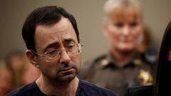 Larry Nassar, a former team USA Gymnastics doctor who pleaded guilty in November 2017 to sexual assault charges, stands during his sentencing hearing in Lansing, Michigan, U.S., January 24, 2018. REUTERS/Brendan McDermid
