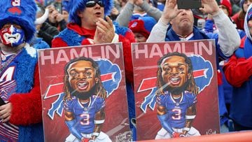 ORCHARD PARK, NEW YORK - JANUARY 08: Buffalo Bills fans hold signs in support of Buffalo Bills safety Damar Hamlin during a game against the New England Patriots at Highmark Stadium on January 08, 2023 in Orchard Park, New York. Hamlin suffered cardiac arrest during the Bills' Monday Night Football game against the Cincinnati Bengals and remains in intensive care.   Bryan M. Bennett/Getty Images/AFP (Photo by Bryan M. Bennett / GETTY IMAGES NORTH AMERICA / Getty Images via AFP)