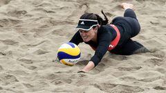US Karissa Cook dives for the ball during a Lima 2019 Pan-American Games women&#039;s beach volleyball match against Trinidad &amp; Tobago at the Beach Volleyball Stadium in Lima, Peru, on July 24, 2019. - The 2019 Pan-American Games will take place from July 26 to August 11. (Photo by LUIS ROBAYO / AFP)