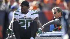 DENVER, COLORADO - OCTOBER 23: Breece Hall #20 of the New York Jets is carted off the field after an apparent injury following a play against the Denver Broncos during the first half at Empower Field At Mile High on October 23, 2022 in Denver, Colorado.   Dustin Bradford/Getty Images/AFP