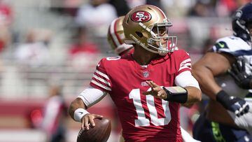 SANTA CLARA, CALIFORNIA - SEPTEMBER 18: Jimmy Garoppolo #10 of the San Francisco 49ers passes the ball against the Seattle Seahawks during the first half at Levi's Stadium on September 18, 2022 in Santa Clara, California.   Thearon W. Henderson/Getty Images/AFP