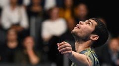 Spain's Carlos Alcaraz looks up during his men's singles tennis match against Britain's Jack Draper at the Swiss Indoor ATP 500 tennis tournament in Basel on October 24, 2022. (Photo by Fabrice COFFRINI / AFP) (Photo by FABRICE COFFRINI/AFP via Getty Images)