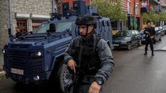 A special police forces officer stands next to an armoured vehicle, following clashes between Kosovo police and ethnic Serb protesters, who tried to prevent a newly-elected ethnic Albanian mayor from entering his office, in the town of Zvecan, Kosovo, May 26, 2023. REUTERS/Valdrin Xhemaj NO RESALES. NO ARCHIVES.