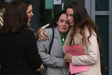 Relatives react after hearing the verdict at the coroner's court in Warrington.
