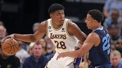 MEMPHIS, TENNESSEE - APRIL 16: Rui Hachimura #28 of the Los Angeles Lakers handles the ball during the second half against Desmond Bane #22 of the Memphis Grizzlies during Game One of the Western Conference First Round Playoffs at FedExForum on April 16, 2023 in Memphis, Tennessee. NOTE TO USER: User expressly acknowledges and agrees that, by downloading and or using this photograph, User is consenting to the terms and conditions of the Getty Images License Agreement.   Justin Ford/Getty Images/AFP (Photo by Justin Ford / GETTY IMAGES NORTH AMERICA / Getty Images via AFP)