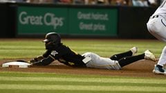 PHOENIX, ARIZONA - AUGUST 09: Rodolfo Castro #14 of the Pittsburgh Pirates slides into third base as his cell phone falls out of his pocket during the fourth inning of a game against the Arizona Diamondbacks at Chase Field on August 09, 2022 in Phoenix, Arizona.   Norm Hall/Getty Images/AFP
== FOR NEWSPAPERS, INTERNET, TELCOS & TELEVISION USE ONLY ==