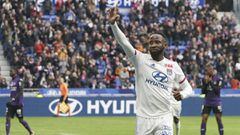 Lyon&#039;s Moussa Dembele celebrates after scoring his side&#039;s second goal during the French League One soccer match between Lyon and Toulouse in Decines, outside Lyon, central France, Sunday, Jan. 26, 2020. (AP Photo/Laurent Cipriani)