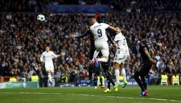 Karim Benzema heads Real Madrid level on a night when he produced a fine performance.