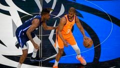 May 8, 2022; Dallas, Texas, USA; Dallas Mavericks forward Reggie Bullock (25) guards Phoenix Suns guard Chris Paul (3) during the first quarter during game four of the second round for the 2022 NBA playoffs at American Airlines Center. Mandatory Credit: Jerome Miron-USA TODAY Sports