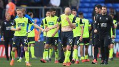 Dejected Alex Pritchard and Aaron Mooy of Huddersfield Town during the Premier League match between Crystal Palace and Huddersfield Town at Selhurst Park on March 30, 2019 in London