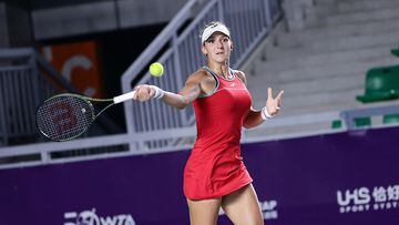 Rebeka Masarova of Spain hits a return against Magda Linette of Poland during their women's singles quarter-final match of the WTA Guangzhou Open tennis tournament in Guangzhou, southern China's Guangdong province on September 21, 2023. (Photo by AFP) / China Out