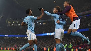 Manchester City&#039;s English midfielder Raheem Sterling (L) celebrates after scoring their third goal with Manchester City&#039;s German midfielder Leroy Sane during the English Premier League football match between Manchester City and Tottenham Hotspur