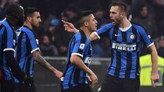 Inter Milan&#039;s defender Stefan de Vrij from Netherlands celebrates after scoring with his teammate during the Italian Serie A football match Inter Milan vs AC Milan on February 9, 2020 at the San Siro stadium in Milan. (Photo by MARCO BERTORELLO / AFP)