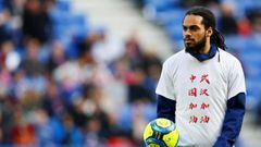 Soccer Football - Ligue 1 - Lyon vs Strasbourg - Groupama Stadium, Lyon, France - February 16, 2020  Olympique Lyonnais&#039; Jason Denayer wears a top with a message of support for Wuhan during the outbreak of Coronavirus during the warm up before the ma