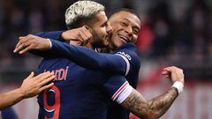 27 September 2020, France, Reims: PSG&#039;s Mauro Icardi (L) celebrates scoring his side&#039;s first goal with teammate Kylian Mbappe during the French Ligue 1 soccer match between Stade de Reims and Paris Saint-Germain at the Auguste-Delaune stadium. P
