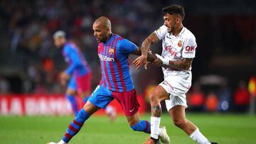 BARCELONA, SPAIN - MAY 01: Dani Alves of FC Barcelona challenges for the ball against Antonio Sanchez of RCD Mallorca during the LaLiga Santander match between FC Barcelona and RCD Mallorca at Camp Nou on May 01, 2022 in Barcelona, Spain. (Photo by Eric Alonso/Getty Images)