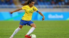 Marta of Brazil handles the ball during the Women&#039;s Group E first round match between Brazil and China PR during the Rio 2016 Olympic Games a