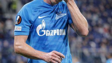 Dmitriy Chistyakov reacts to a mistake wearing the colours of Zenit, a club sponsored by Russian gas gaint Gazprom.