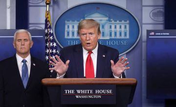 U.S. President Donald Trump answers questions at the daily coronavirus task force briefing flanked by Vice President Mike Pence at the White House in Washington, U.S., April 17, 2020. REUTERS/Leah Millis