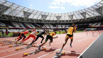 Atletas de diversos pa&iacute;ses entrenan la salida en el Estadio Ol&iacute;mpico de Londres en las v&iacute;speras del Mundial. 