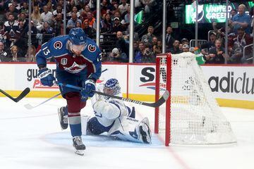 Andrei Vasilevskiy #88 of the Tampa Bay Lightning makes a save against Valeri Nichushkin #13 of the Colorado Avalanche 