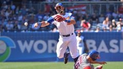 Mar 18, 2017; San Diego, CA, USA; Puerto Rico outfielder Angel Pagan (16) is forced out at second base by Venezuela infielder Rougned Odor (12) during the 2017 World Baseball Classic at Petco Park. Puerto Rico won 13-2. Mandatory Credit: Orlando Ramirez-U