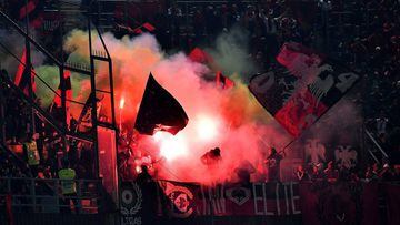Albania&#039;s supporters light flares in the stands during the FIFA World Cup 2018 qualification football match between Italy and Albania on March 24, 2017 at Renzo Barbera stadium in Palermo.  / AFP PHOTO / ALBERTO PIZZOLI