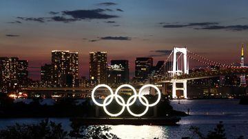 The Olympic Rings are seen in front of the skyline during sunset one night ahead of the official opening of the Tokyo 2020 Olympic Games in Tokyo, Japan, July 22, 2021.