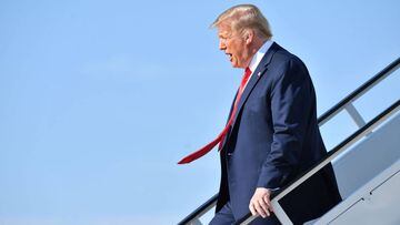 (FILES) In this file photo taken on June 20, 2020 US President Donald Trump steps off Air Force One at Tulsa International Airport on his way to his campaign rally at the BOK Center in Tulsa, Oklahoma. - US President Donald Trump said June 22, 2020 he wou
