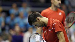 Novak Djokovic reacts during the doubles rubber. 