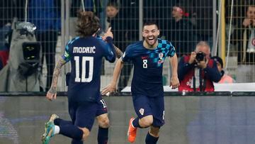 Modric y Kovacic celebran el primer gol del partido.
