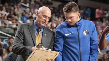 DALLAS, TX - OCTOBER 28:  Head Coach Rick Carlisle talks with Luka Doncic #77 of the Dallas Mavericks against the Utah Jazz during a game on October 28, 2018 at American Airlines Center in Dallas, Texas. NOTE TO USER: User expressly acknowledges and agrees that, by downloading and/or using this Photograph, user is consenting to the terms and conditions of the Getty Images License Agreement. Mandatory Copyright Notice: Copyright 2018 NBAE (Photo by Glenn James/NBAE via Getty Images)