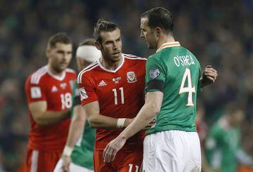 Wales' Gareth Bale and Republic of Ireland's John O'Shea after the match.