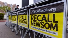 FILE PHOTO: Signs are shown at a rally for the recall campaign of California governor Gavin Newsom in Carlsbad, California, U.S., June 30, 2021.   REUTERS/Mike Blake/File Photo