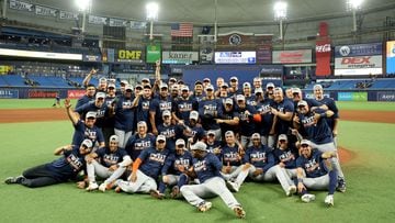 ST PETERSBURG, FLORIDA - SEPTEMBER 19: The Houston Astros celebrates winning the American League West Division following a game against the Tampa Bay Rays at Tropicana Field on September 19, 2022 in St Petersburg, Florida.   Mike Ehrmann/Getty Images/AFP