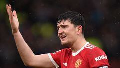 Manchester United's English defender Harry Maguire reacts during the English Premier League football match between Manchester United and Southampton at Old Trafford in Manchester, north west England, on February 12, 2022. (Photo by Oli SCARFF / AFP) / RESTRICTED TO EDITORIAL USE. No use with unauthorized audio, video, data, fixture lists, club/league logos or 'live' services. Online in-match use limited to 120 images. An additional 40 images may be used in extra time. No video emulation. Social media in-match use limited to 120 images. An additional 40 images may be used in extra time. No use in betting publications, games or single club/league/player publications. / 