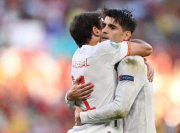 Álvaro Morata celebrates scoring Spain's fourth goal against Croatia with Mikel Oyarzabal.