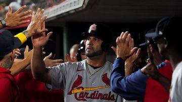 CINCINNATI, OHIO - AUGUST 29: Albert Pujols #5 of the St. Louis Cardinals celebrates scoring a run in the second inning against the Cincinnati Reds at Great American Ball Park on August 29, 2022 in Cincinnati, Ohio.   Dylan Buell/Getty Images/AFP
== FOR NEWSPAPERS, INTERNET, TELCOS & TELEVISION USE ONLY ==