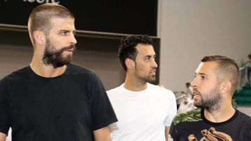 Barcelona players Gerard Pique (L), Jordi Alba (R) and Sergio Busquets (C) visit the new extension of the Aspire Academy Sports Academy under construction in Doha on July 5, 2017.