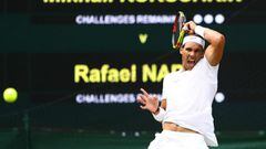 Nadal eases past De Minaur to stay on top of the world