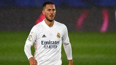(FILES) In this file photo taken on April 24, 2021 Real Madrid&#039;s Belgian forward Eden Hazard walks in the rain during the Spanish League football match between Real Madrid CF and Real Betis at the Alfredo di Stefano stadium in Valdebebas, on the outs