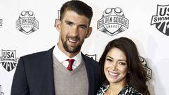 Michael Phelps, con su esposa Nicole Johnson y su hijo Boomer.